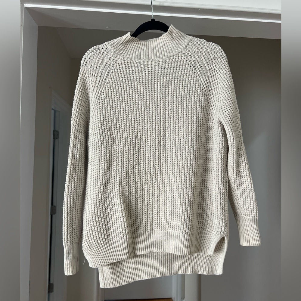 Cableknit sweater
